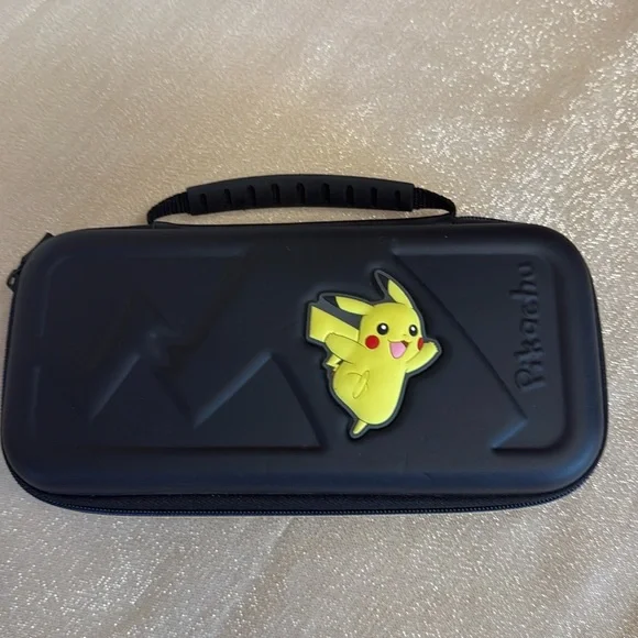 COPY - Pokemon trading card game mat & Nintendo Switch Pikachu case.